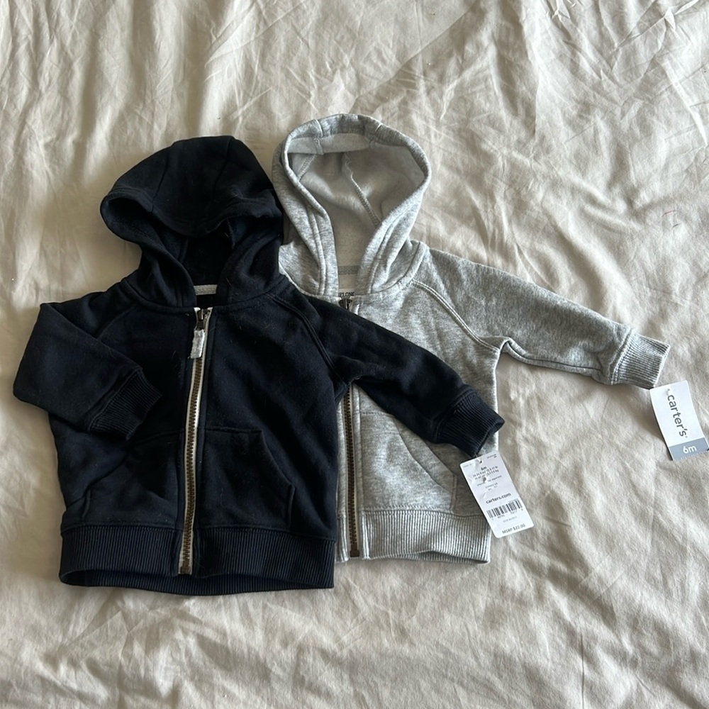 Set of 2 brand new Carter’s zip up hoodies